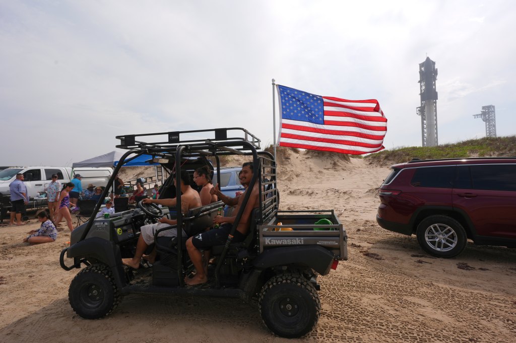 Spectators gather near the Texas facility for a glimpse of the launch.