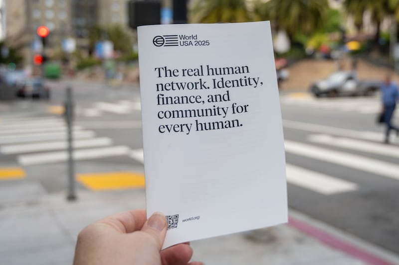 Pamphlet for World Human Network at Union Square location in San Francisco, California for World, formerly Worldcoin, a biometric cryptocurrency company founded by Sam Altman using iris scanning to identify humans online, May 13, 2025. (Photo by Smith Collection/Gado/Getty Images)