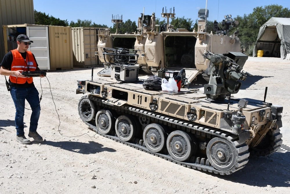 An operator controls a Robotic Combat Vehicle.
