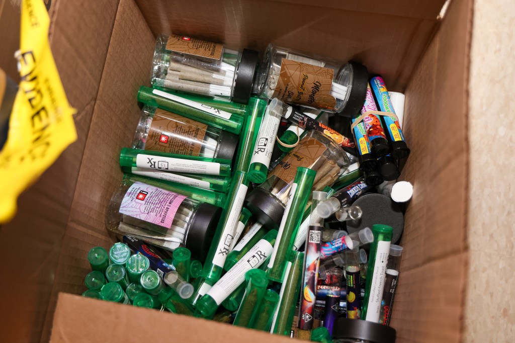 Suffolk County Executive Ed Romaine and Suffolk County Police Commissioner Kevin Catalina show off the large amount of illegal cannabis products that were confiscated throughout Suffolk County, NY in a large-scale crackdown of illegal cannabis shops