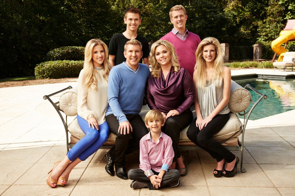 The Chrisley family posing together.
