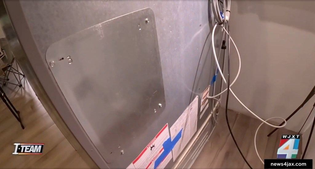 The back of the refrigerator where the water line was supposed to be placed in the initial installation.