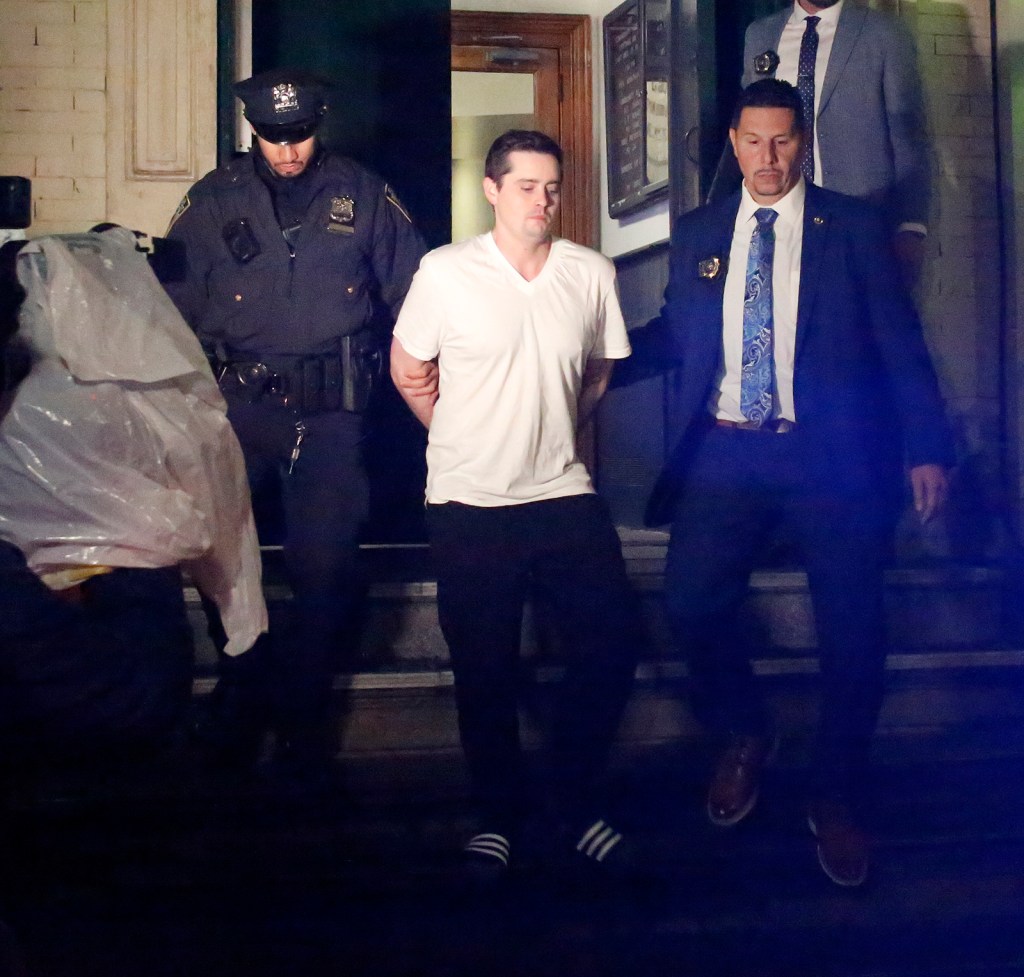 Suspect John Woeltz is taken by Police from Manhattan's 5th Precinct to Manhattan Central Booking.