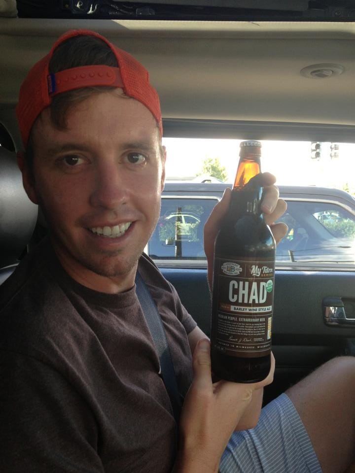 Man holding beer bottle