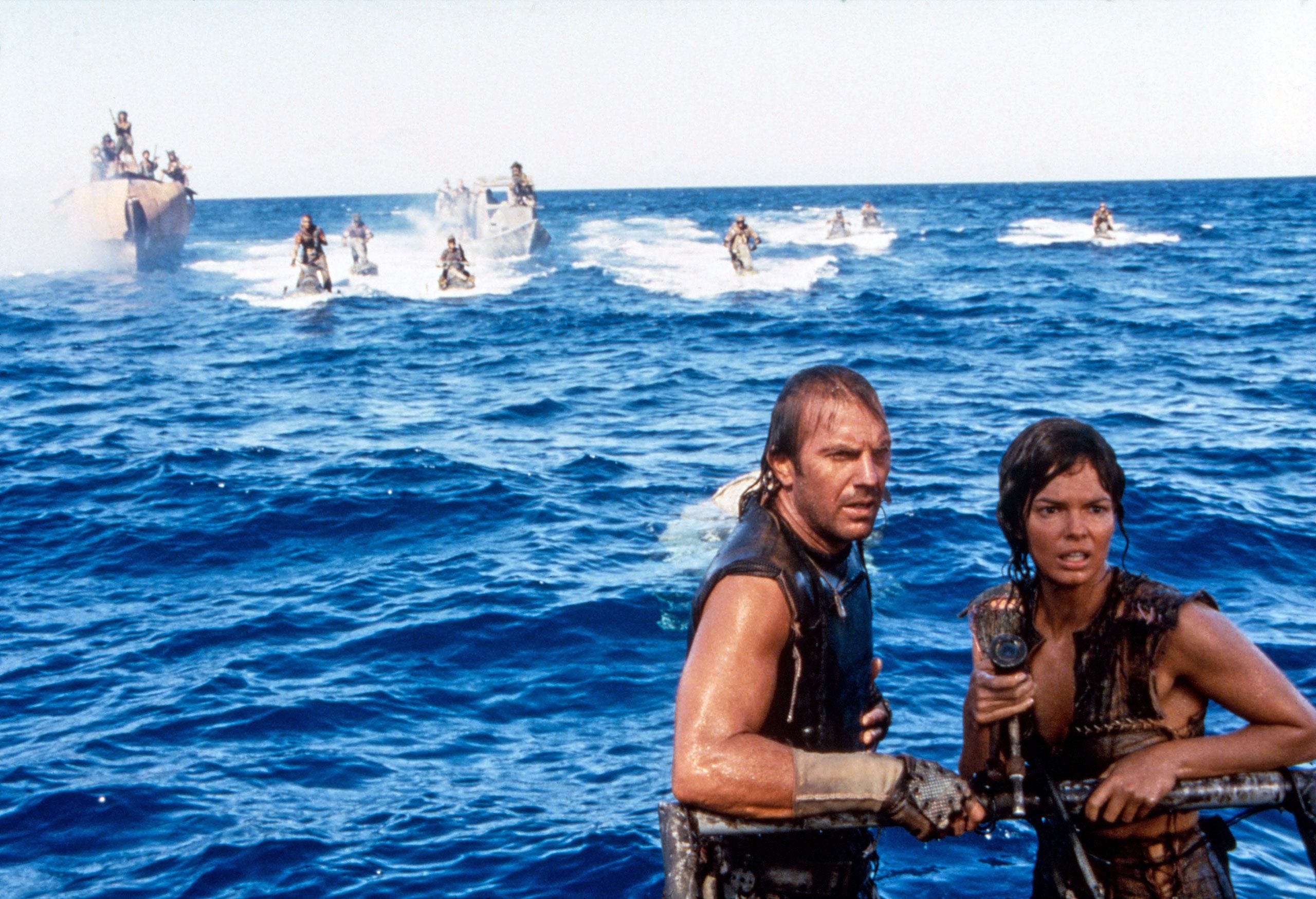Kevin Costner and Jeanne Tripplehorn in "Waterworld" (1995).