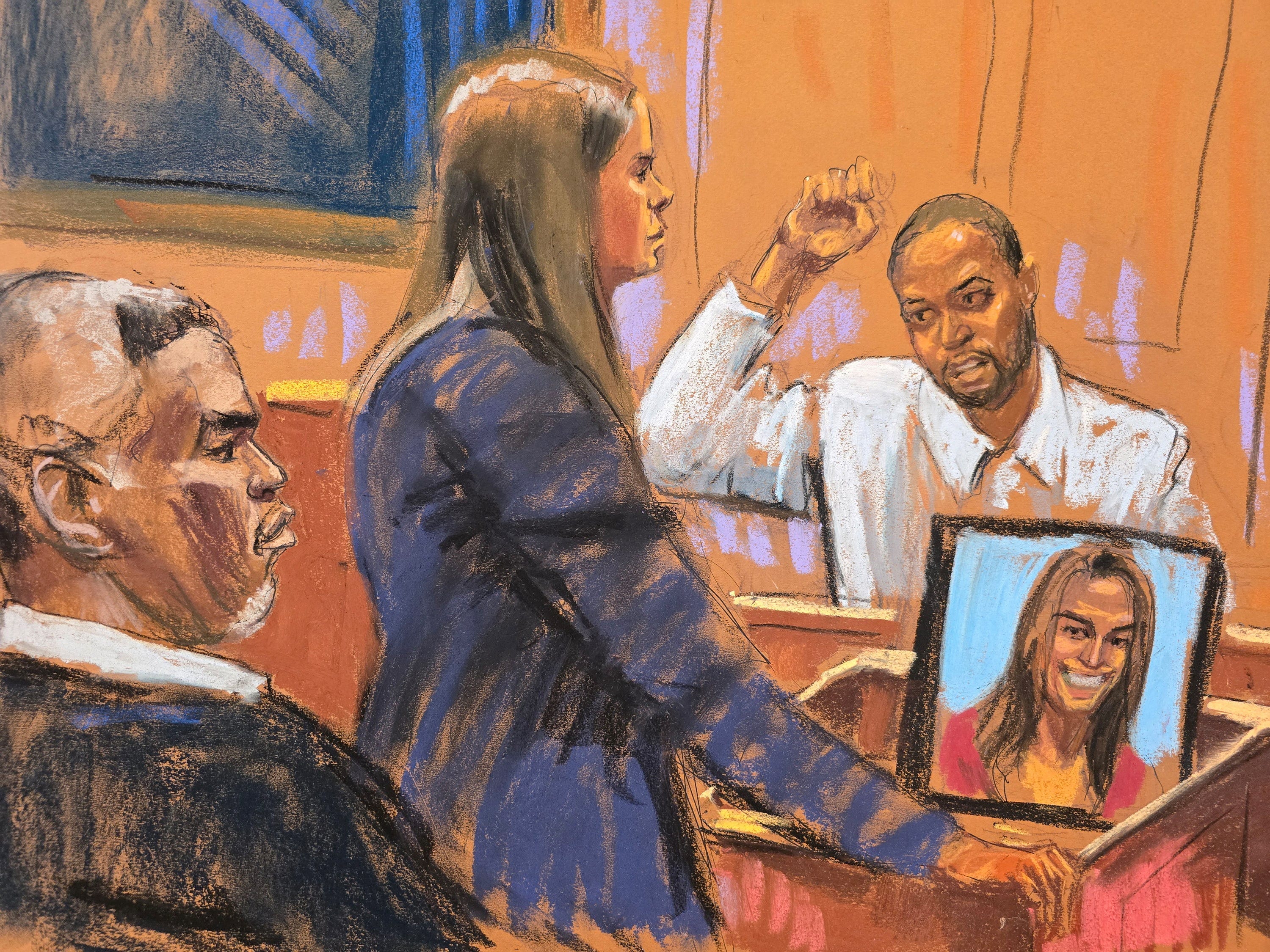 Sean "Diddy" Combs watches at his Manhattan sex-trafficking and racketeering trial as prosecutor Maurene Comey questions celebrity stylist Deonte Nash.