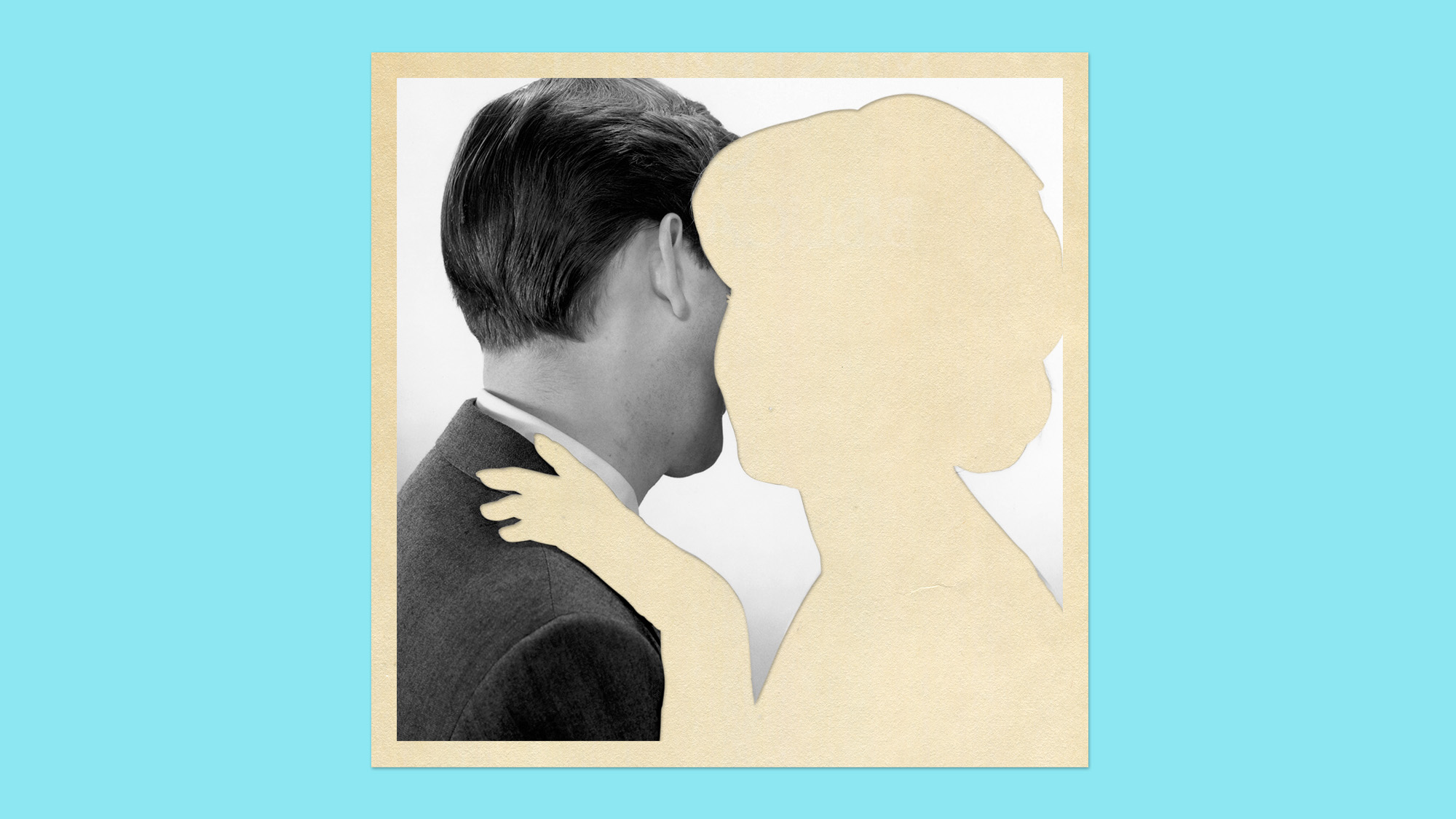 A black-and-white image of a man with an empty space where a woman might be hugging him