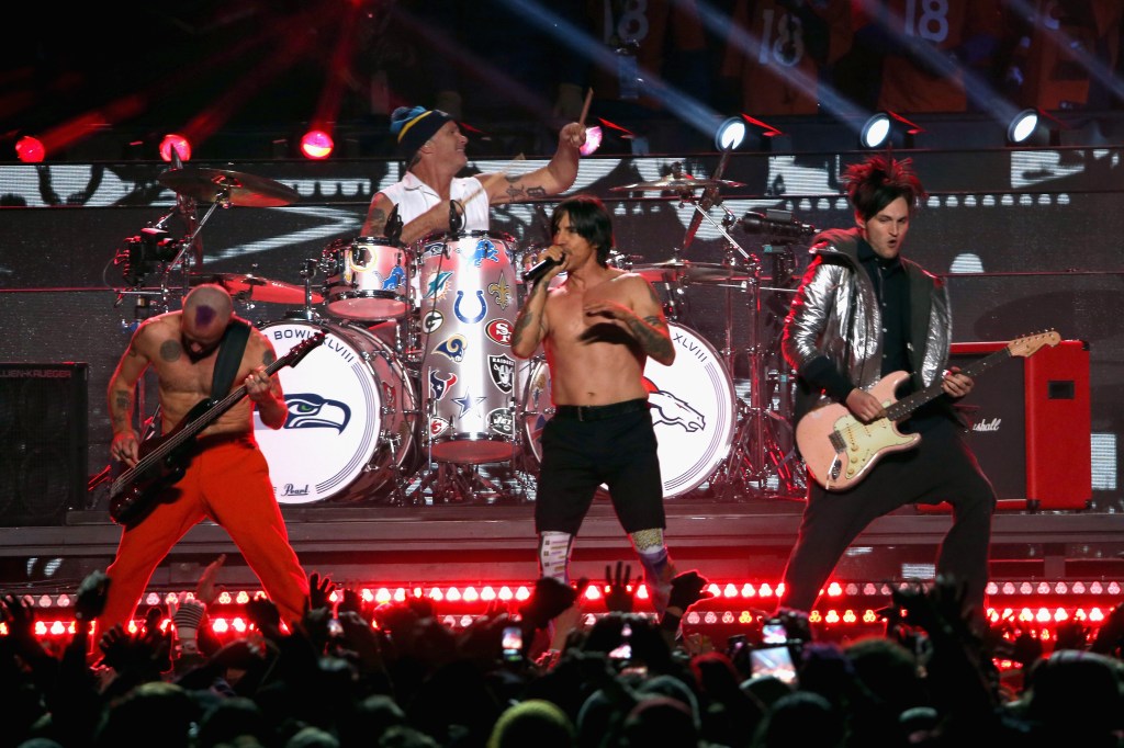 Flea, Chad Smith, Anthony Kiedis and Josh Klinghoffer of the Red Hot Chili Peppers perform during the Pepsi Super Bowl XLVIII Halftime Show at MetLife Stadium on February 2, 2014 in East Rutherford, New Jersey.