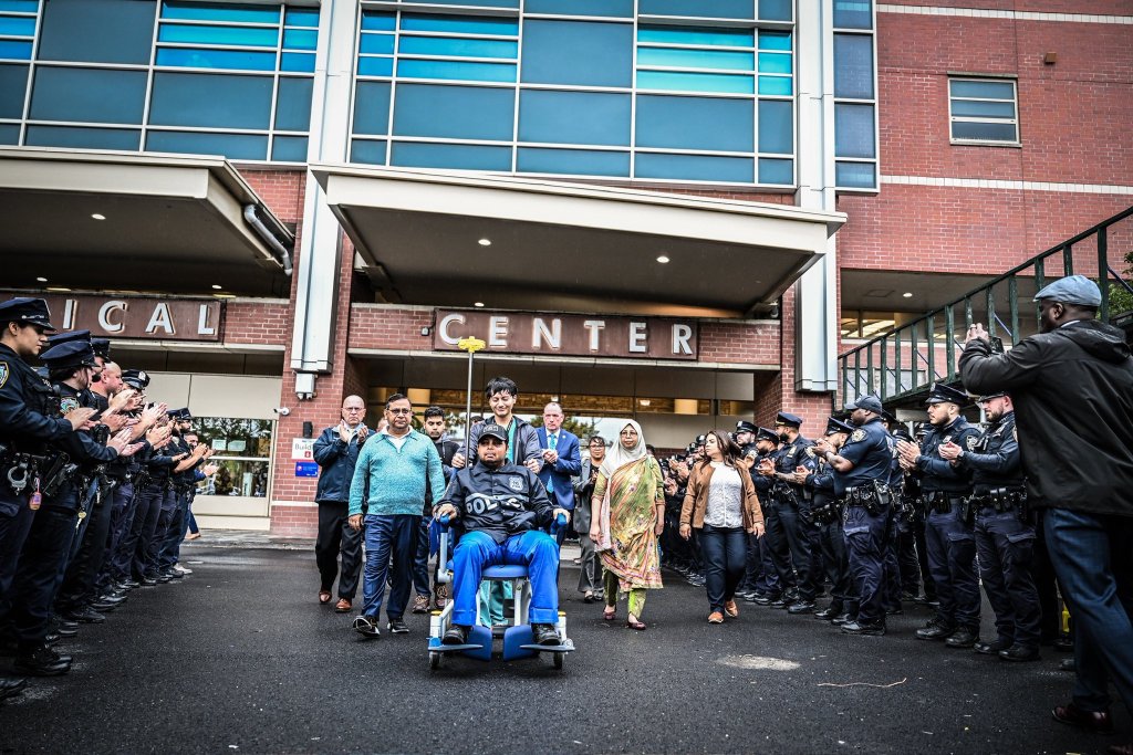 Police Commissioner Jessica Tisch and scores of other cops give him a guard of honor as he was escorted out.