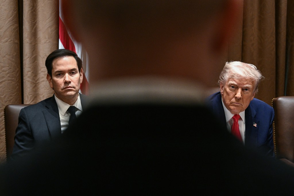 President Donald Trump and Secretary of State Marco Rubio (L) attend a cabinet meeting in the Cabinet Room of the White House on April 10, 2025, in Washington, DC.