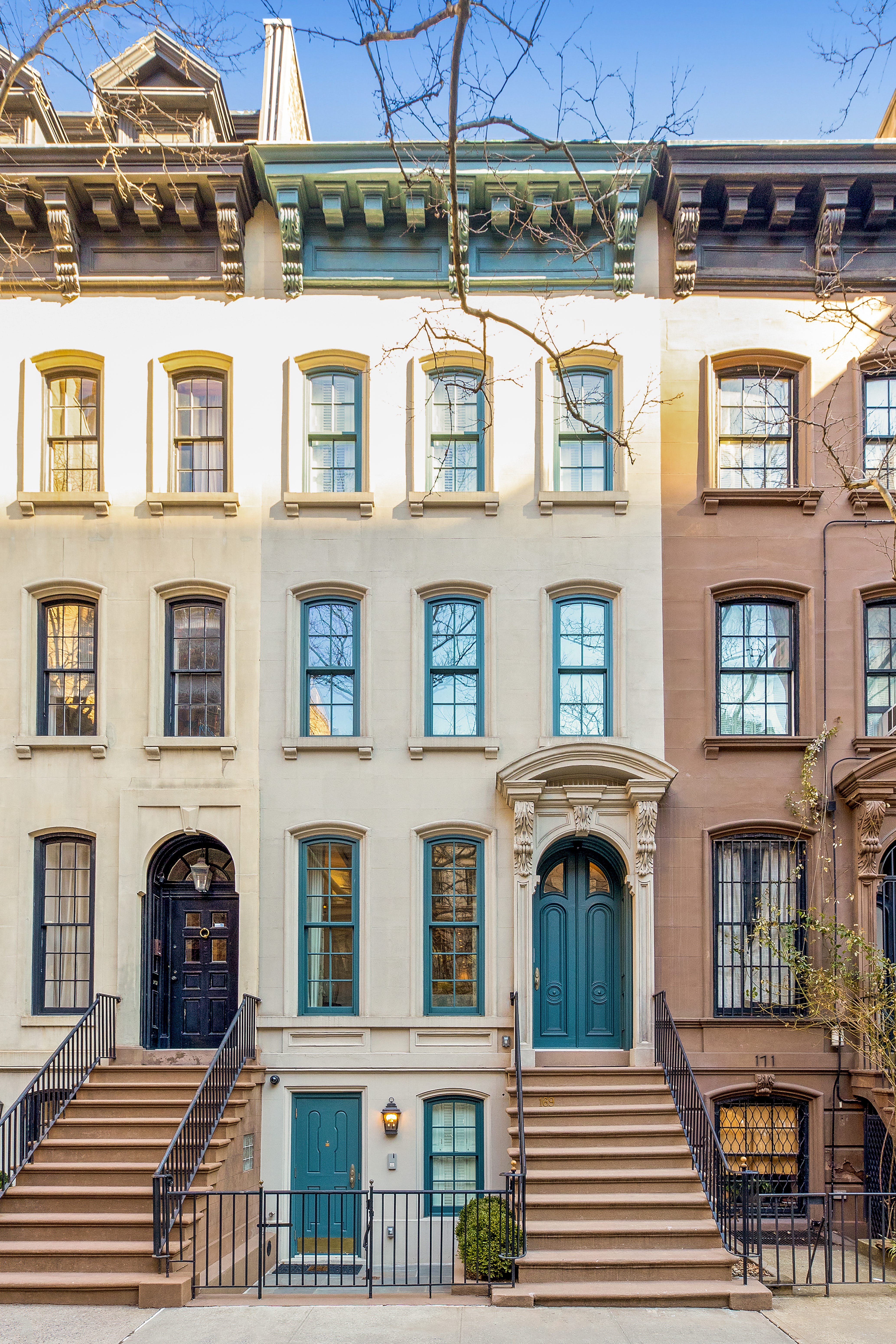 169 East 71st Street exterior with blue door