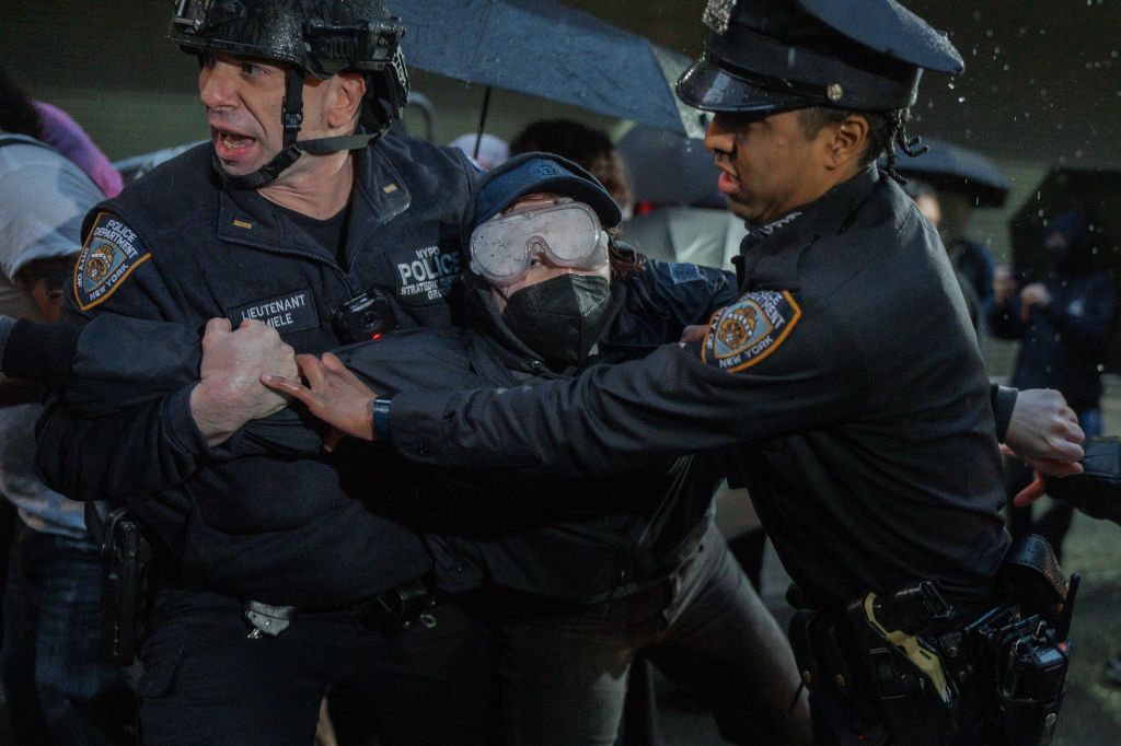 Protester being detained by police during a demonstration outside the Varick ICE facility in Manhattan, New York, USA, 28 May 2025