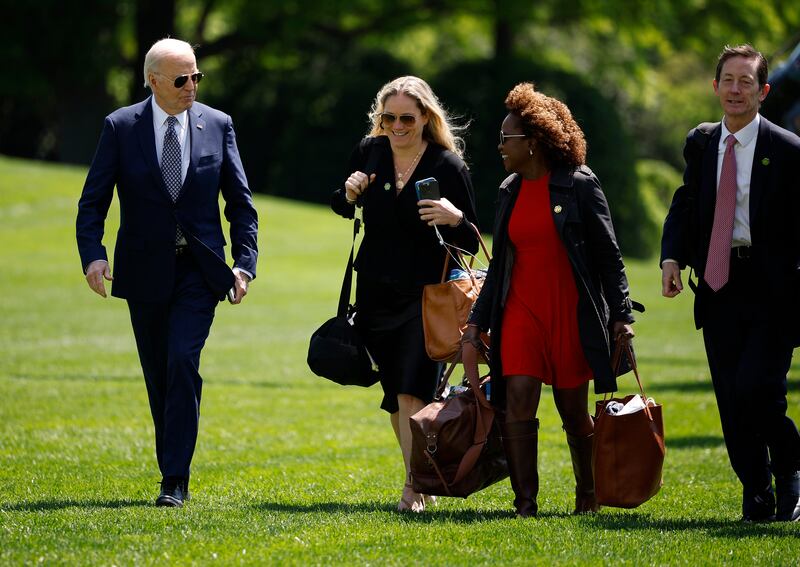 Joe Biden with Annie Tomasini, Karine Jean-Pierre, and Bruce Reed