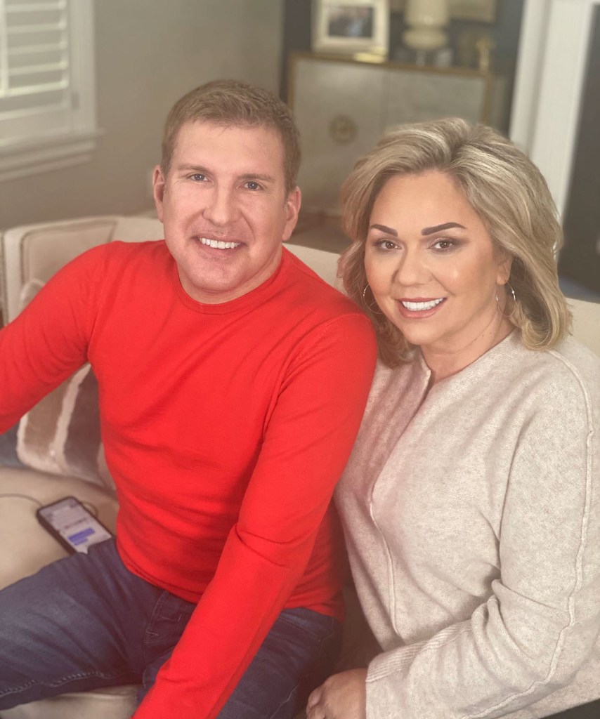 Julie Chrisley and Todd Chrisley pose together.