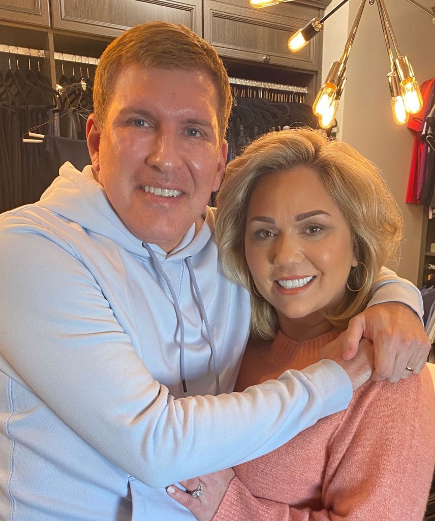 Julie Chrisley and Todd Chrisley pose together.