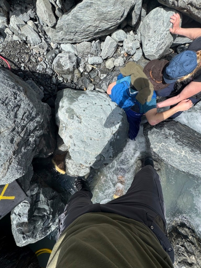 A boulder pinned down Kell Morris for three hours.