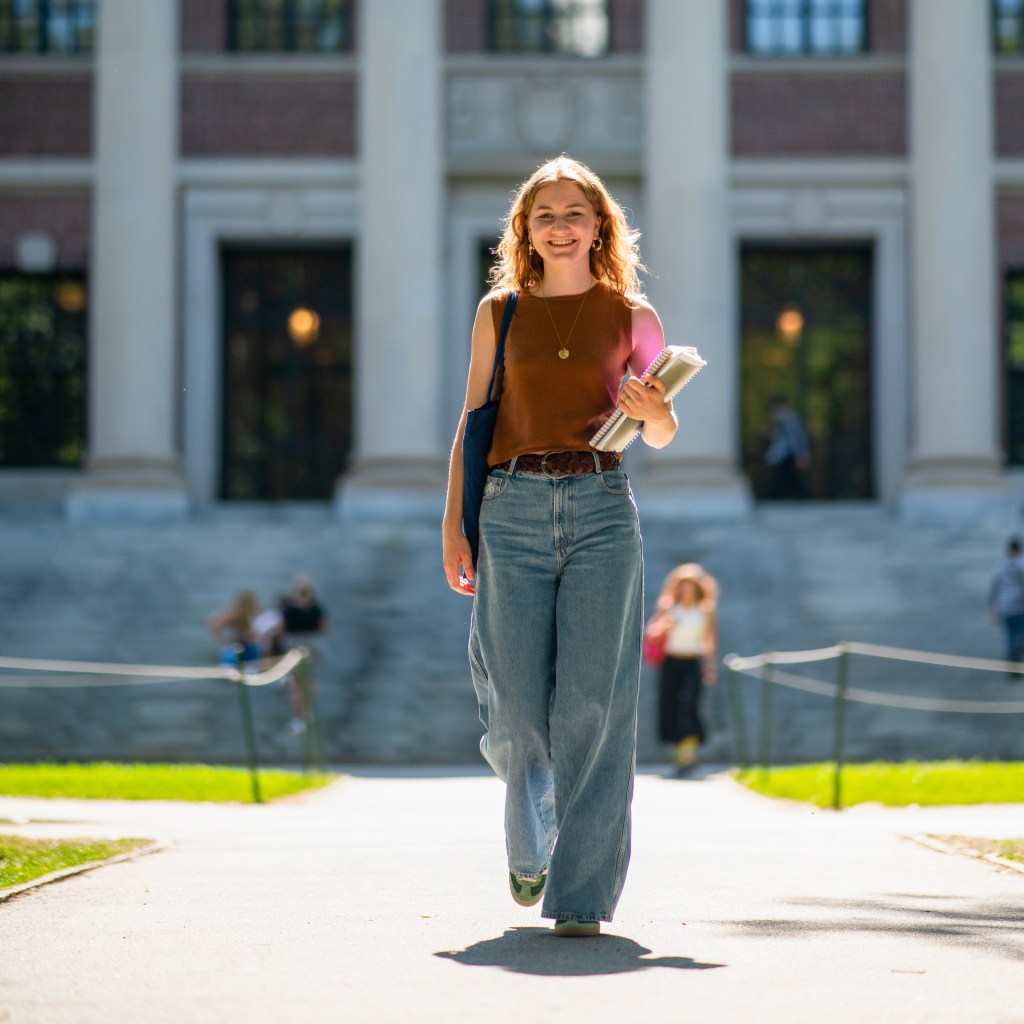 Princess Elisabeth of Belgium posing at Harvard University campus, facing uncertainty due to President Trump's policy towards international students