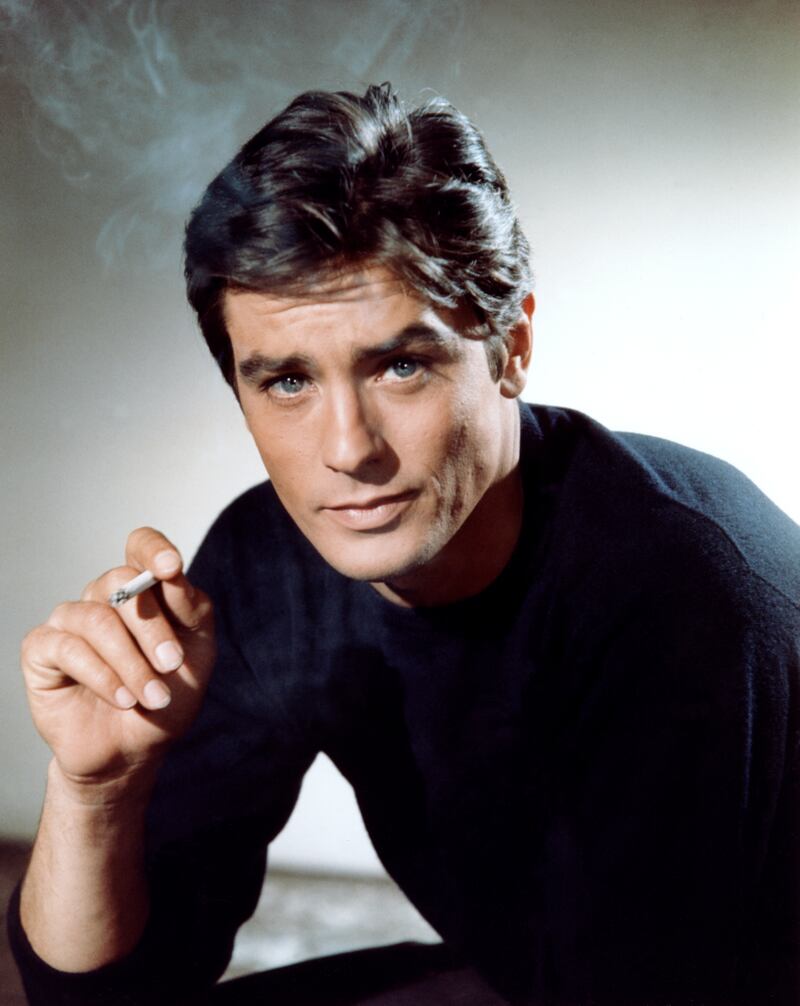 French actor Alain Delon as he appears in 'The Yellow Rolls-Royce', directed by British Anthony Asquith, 1964. (Photo by Sunset Boulevard/Corbis via Getty Images)