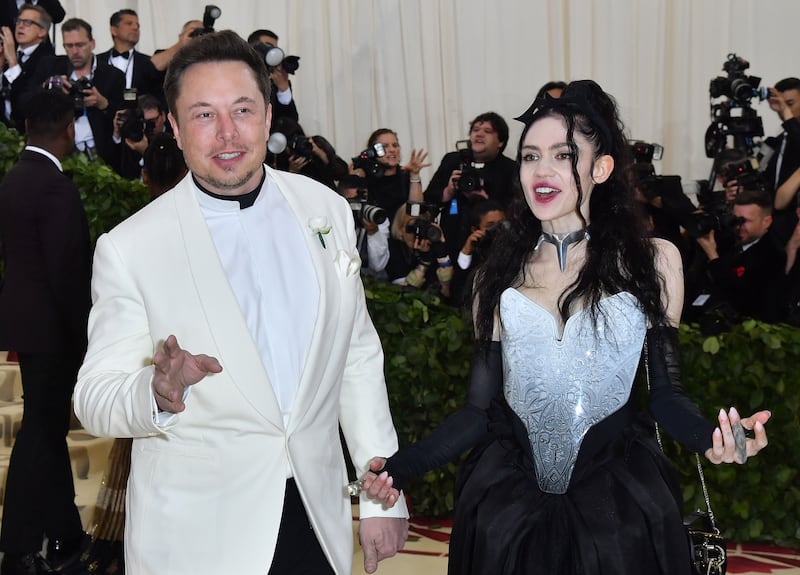 Elon Musk and Grimes arrive for the 2018 Met Gala on May 7, 2018, at the Metropolitan Museum of Art in New York.