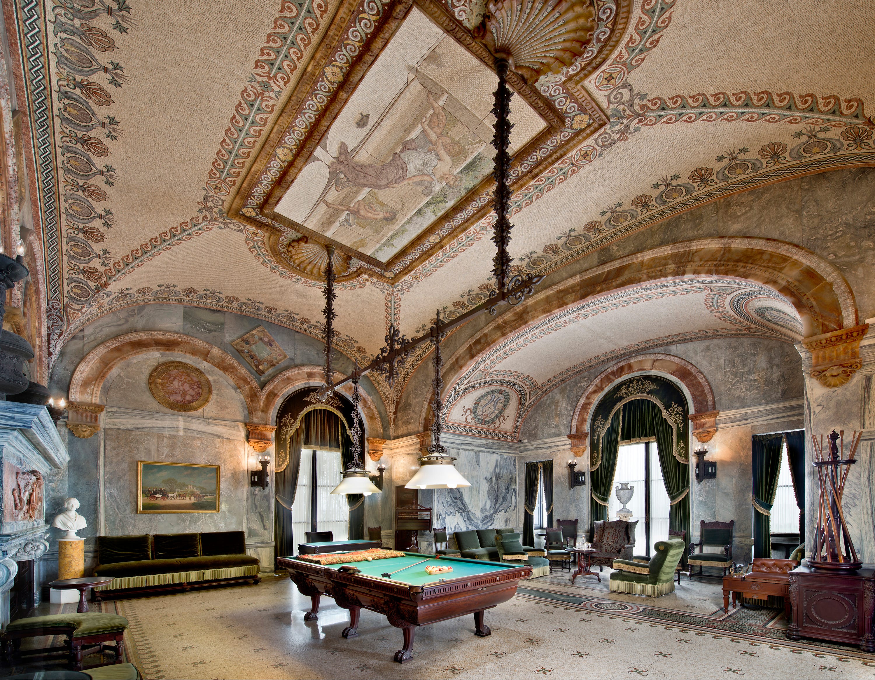 The Billard Room at The Breakers. A pool table in a room with a mosaic ceiling.