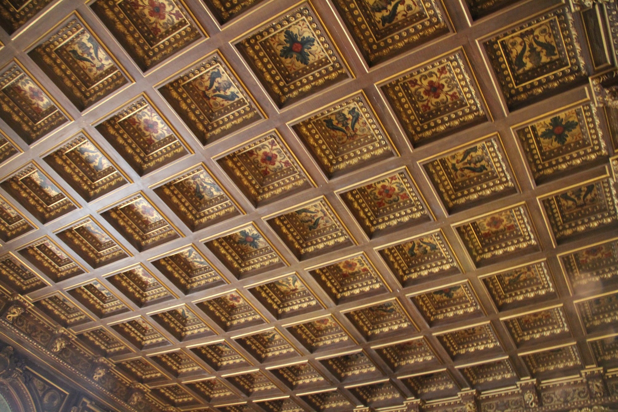 The ceiling of the library in The Breakers with ornate squares.