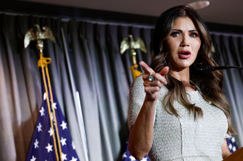 Kristi Noem points as she speaks at the Calvin Coolidge Foundation conference at the Library of Congress on February 17, 2023 in Washington, DC.