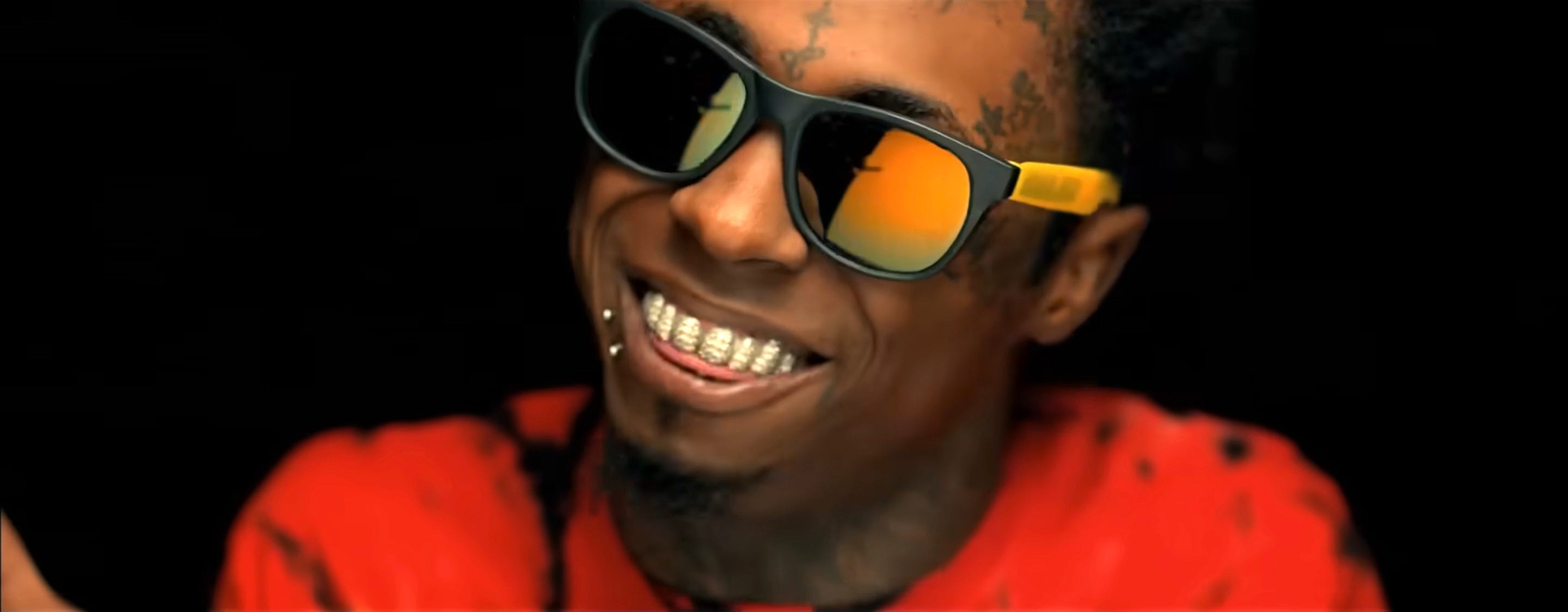 Lil Wayne in the "Love Me" music video.