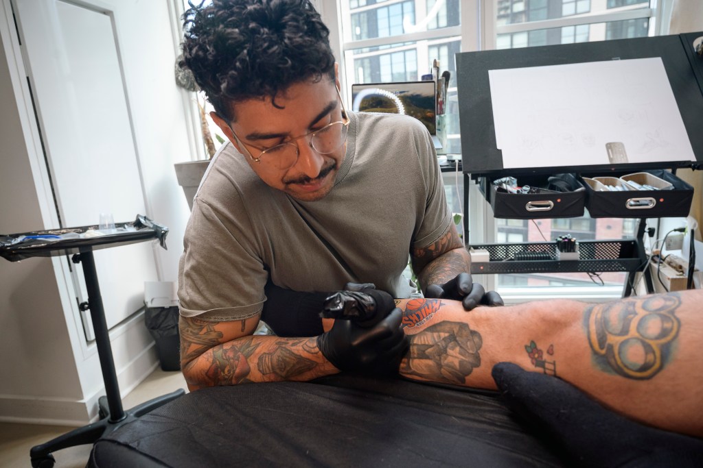 Steven Avalos, a Brooklyn tattoo artist, in his studio.