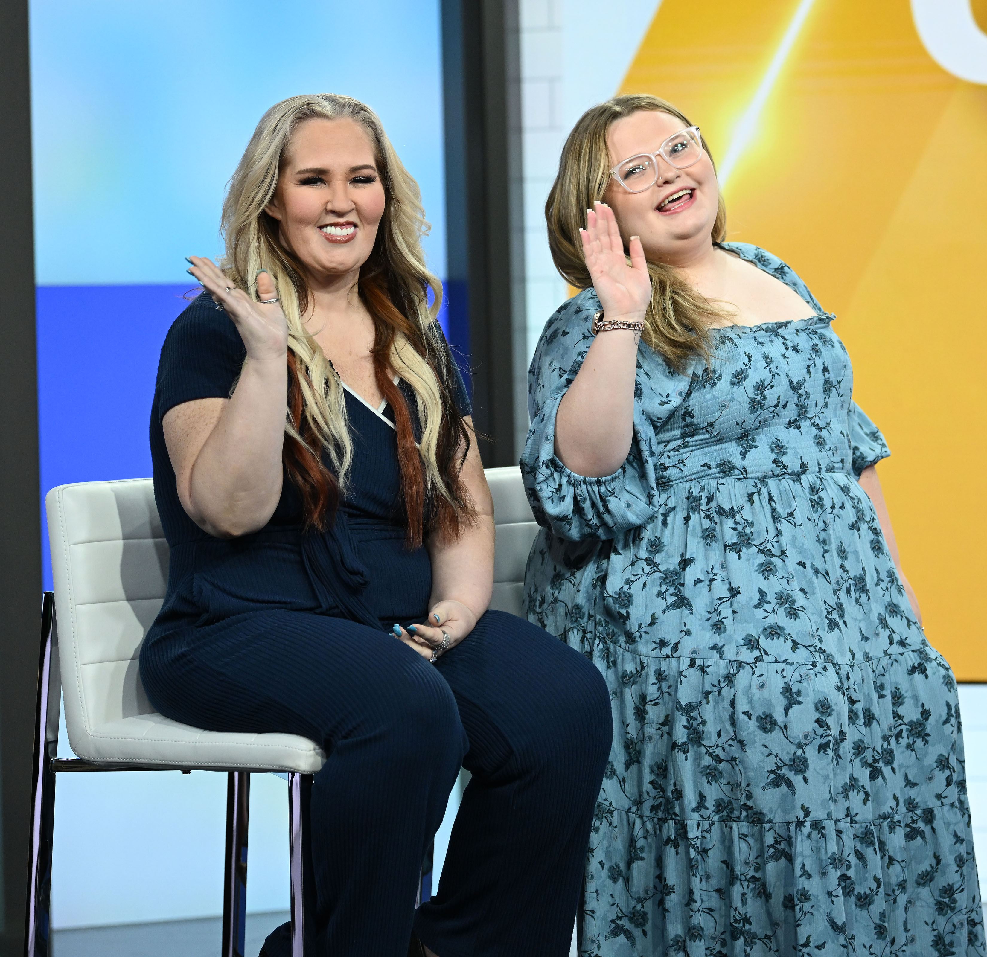 Honey Boo Boo and Mama June sit on a TV set together. 