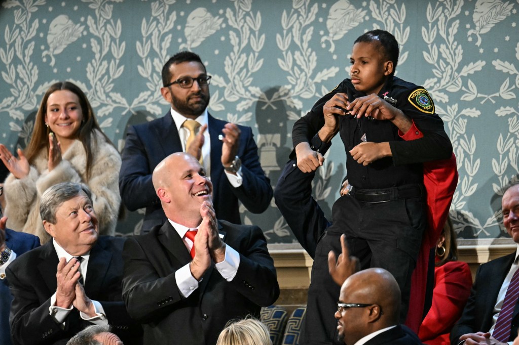 DJ Daniel (right) was sworn in by Donald Trump before a joint session of Congress on March 4.