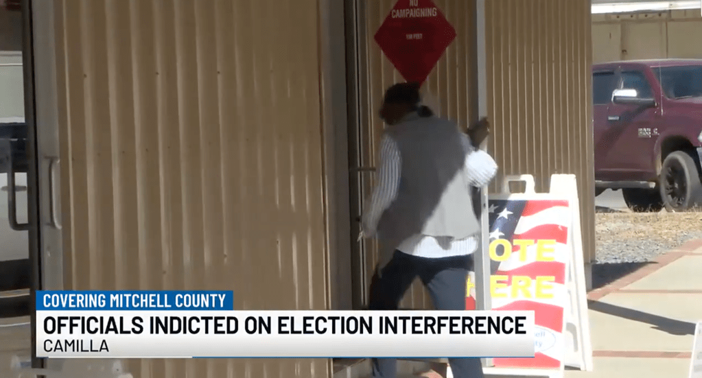 A woman enters a polling station in the city of Camilla, Georgia.