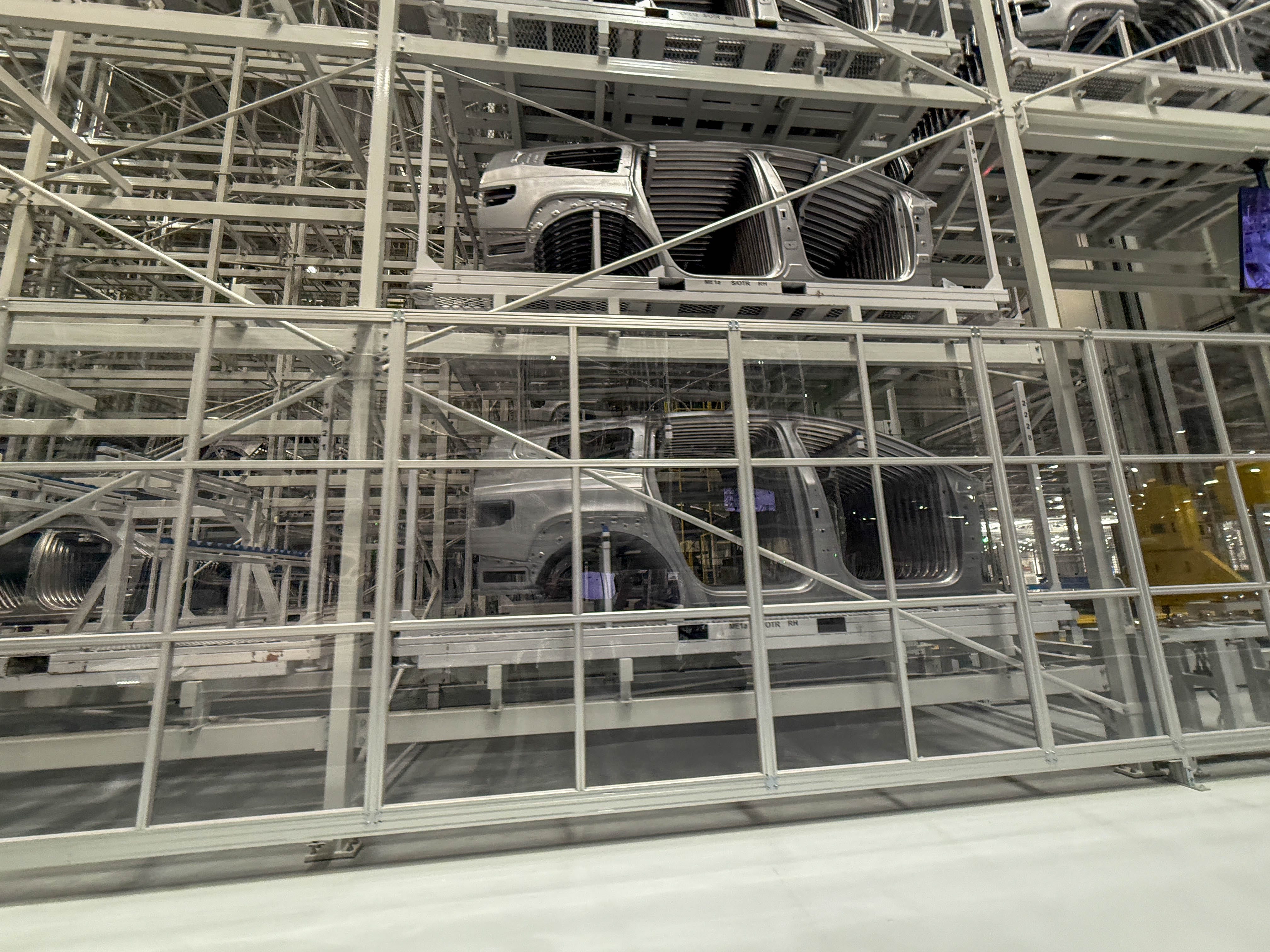 Stamped parts of a Hyundai Ioniq 9 EV in storage racks at the Hyundai Motor Group Metaplant America in Georgia.