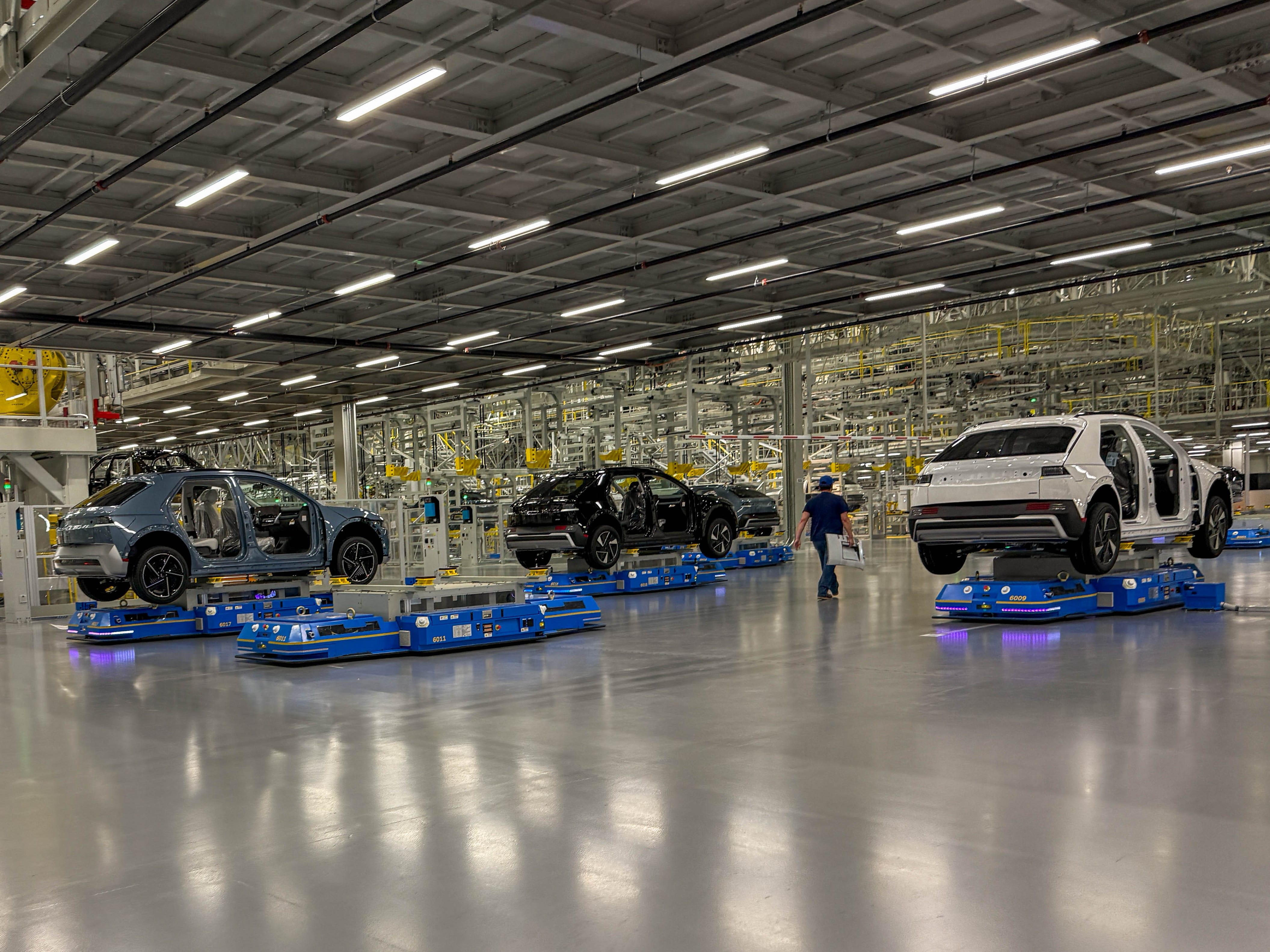 Three Hyundai Ioniq 5 EVs at the Hyundai Motor Group Metaplant America in Georgia.