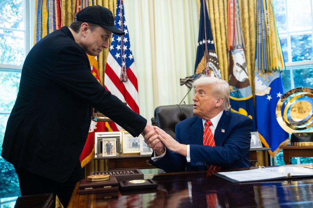 Trump shakes Musk's hand at the White House on his final day.