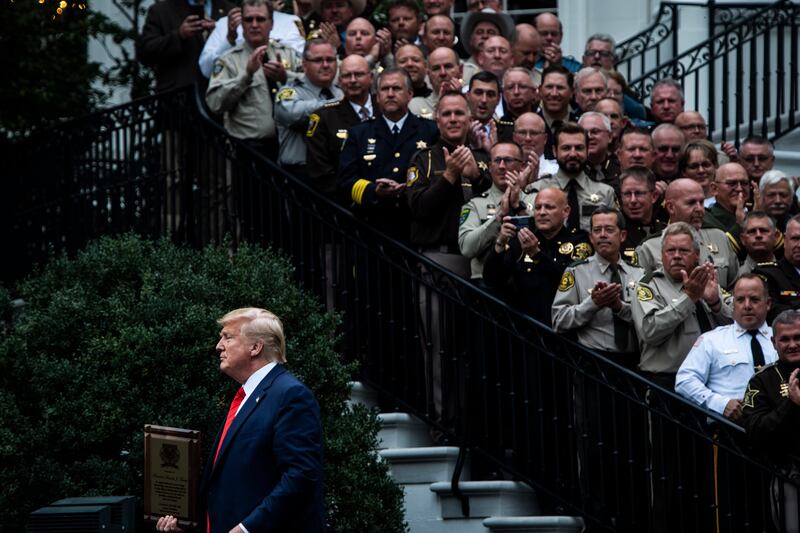 Sheriffs present President Donald Trump with an appreciation plaque at the White House on September 26, 2019 in Washington, D.C.
