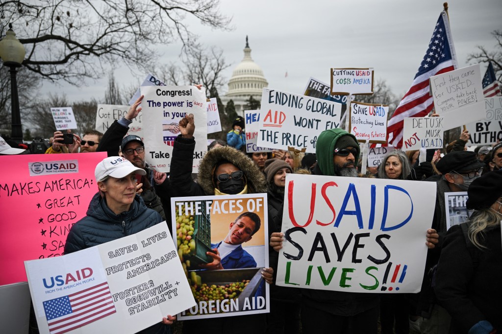 People protest against the administration of US President Donald Trump's decision to virtually shut down the United States Agency for International Development (USAID) at the US Capitol in Washington, DC, on February 5, 2025.