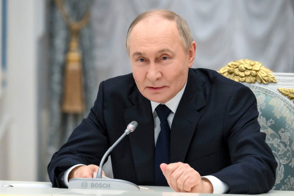 Russian President Vladimir Putin holds a meeting with members of Russia's business community at the Kremlin in Moscow, Russia, Monday, May 26, 2025.