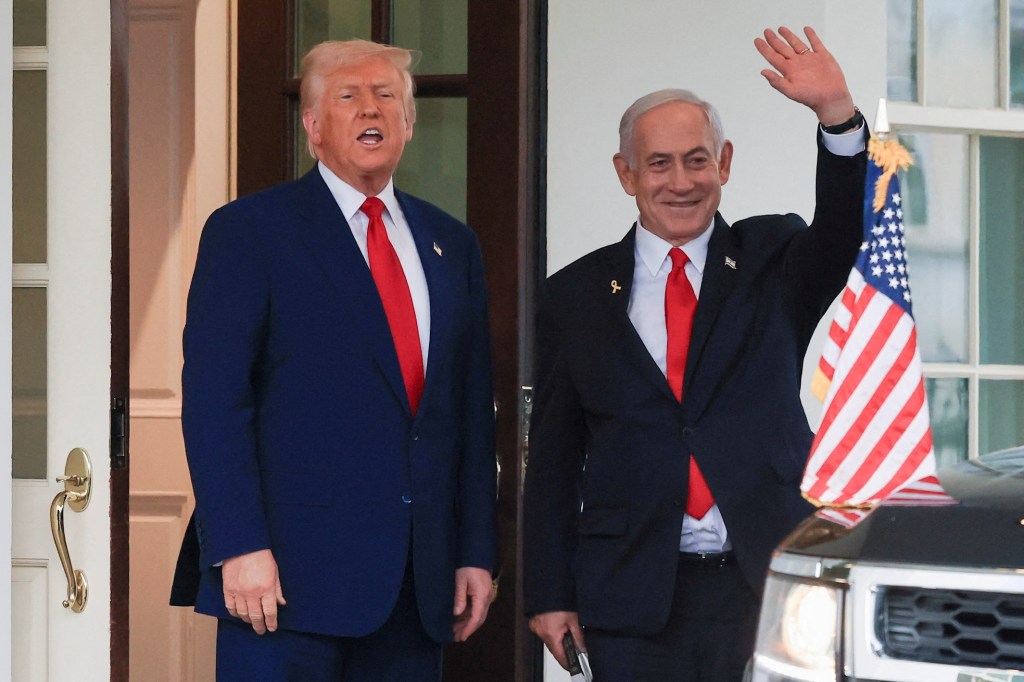 President Donald Trump speaks as Israeli Prime Minister Benjamin Netanyahu waves following a meeting in the White House, in Washington, U.S., April 7, 2025. REUTERS/Kevin Mohatt/File Photo