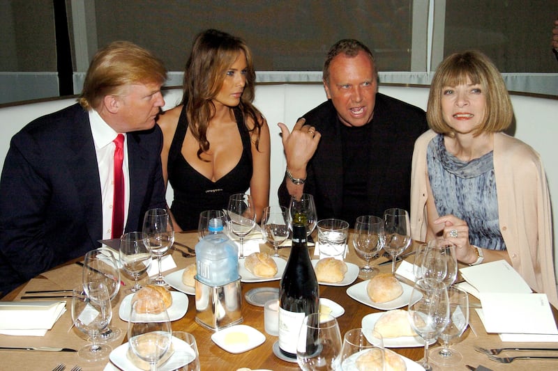 Donald Trump, Melania Trump, Michael Kors and Anna Wintour attend a 2005 party. Wintour's rift with Melania escalated when the first lady was not put on the cover of Vogue.