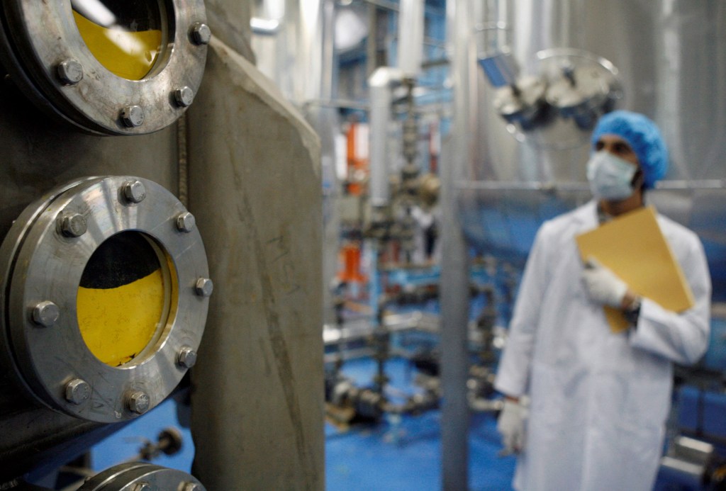A technician is seen at an Iranian uranium conversion facility in Isfahan, February 3, 2007. 