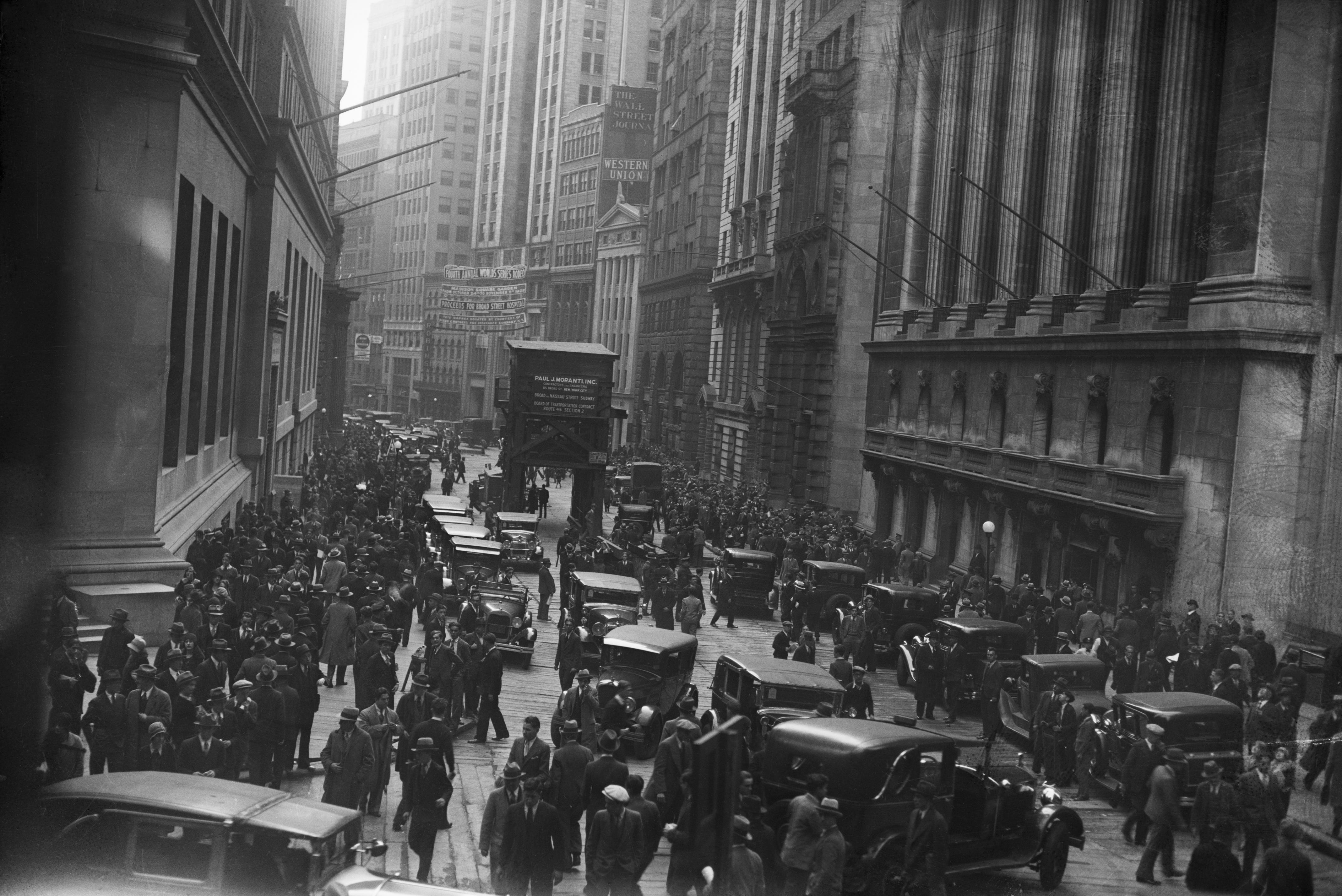 Crowds on the street after 1929 market crash that started the Great Depression.