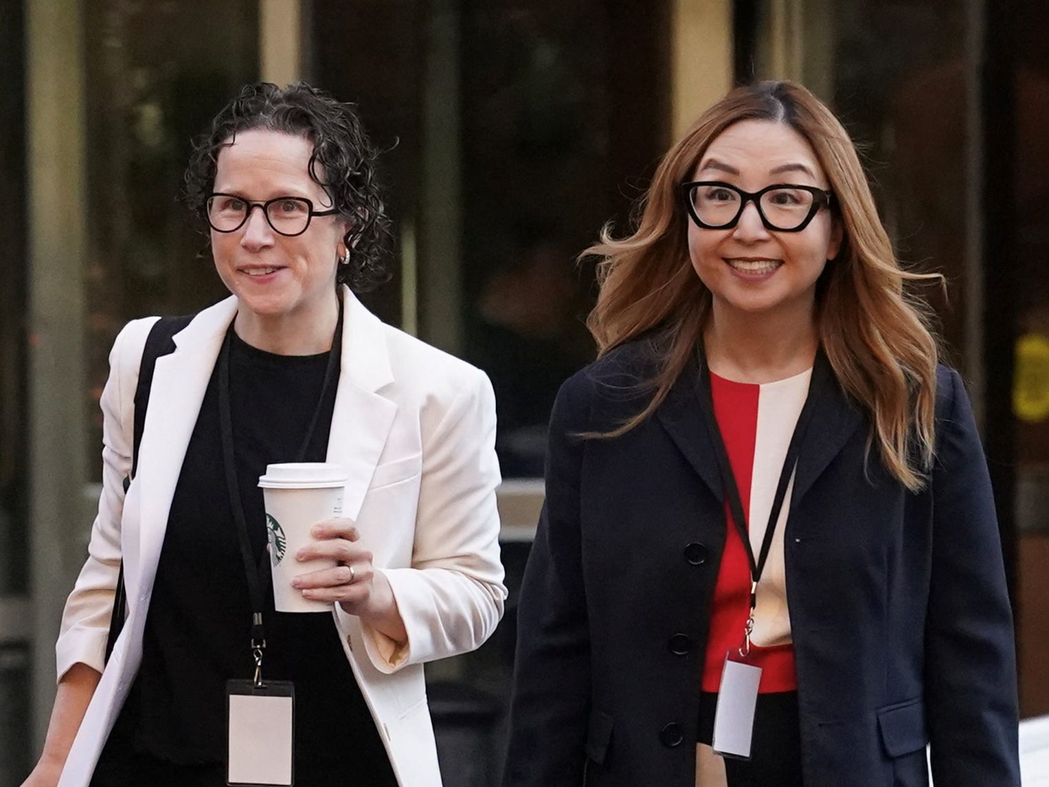 Representing Google, attorneys Karen Dunn and Jeannie Rhee arrive at the courthouse for opening arguments in Google's second antitrust case.