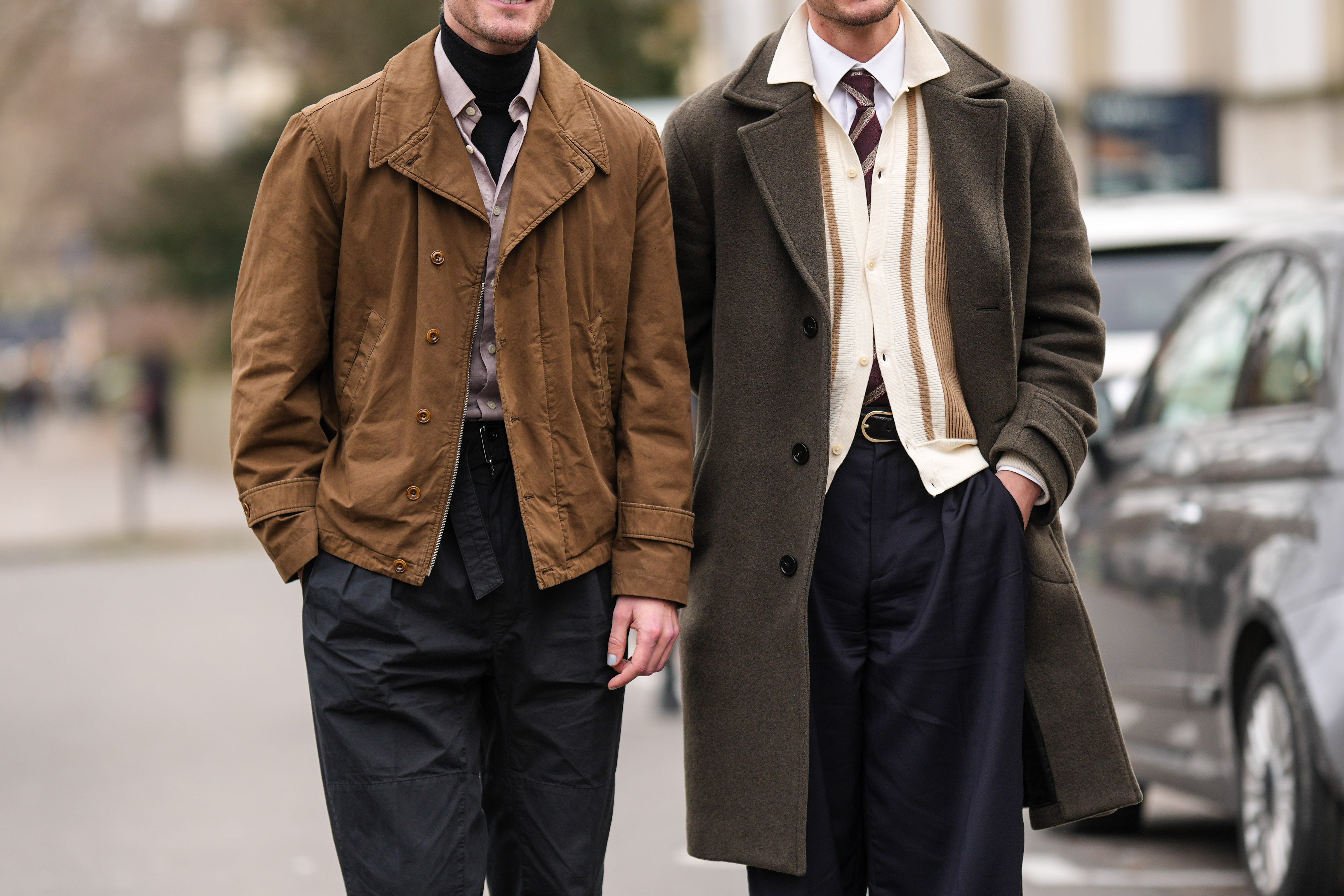 Men wearing neutral colored jackets
