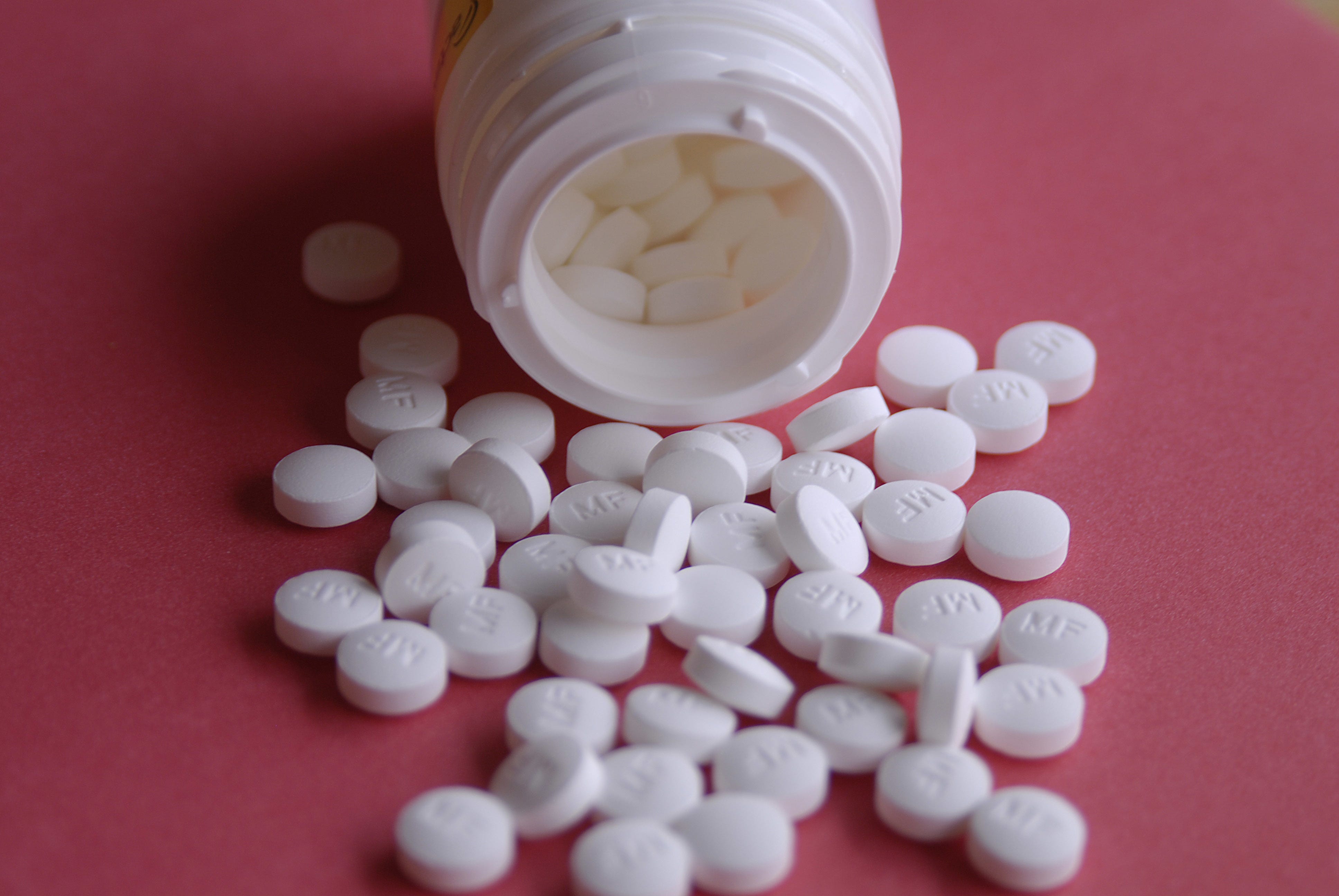 metformin pills spilling out of the bottle