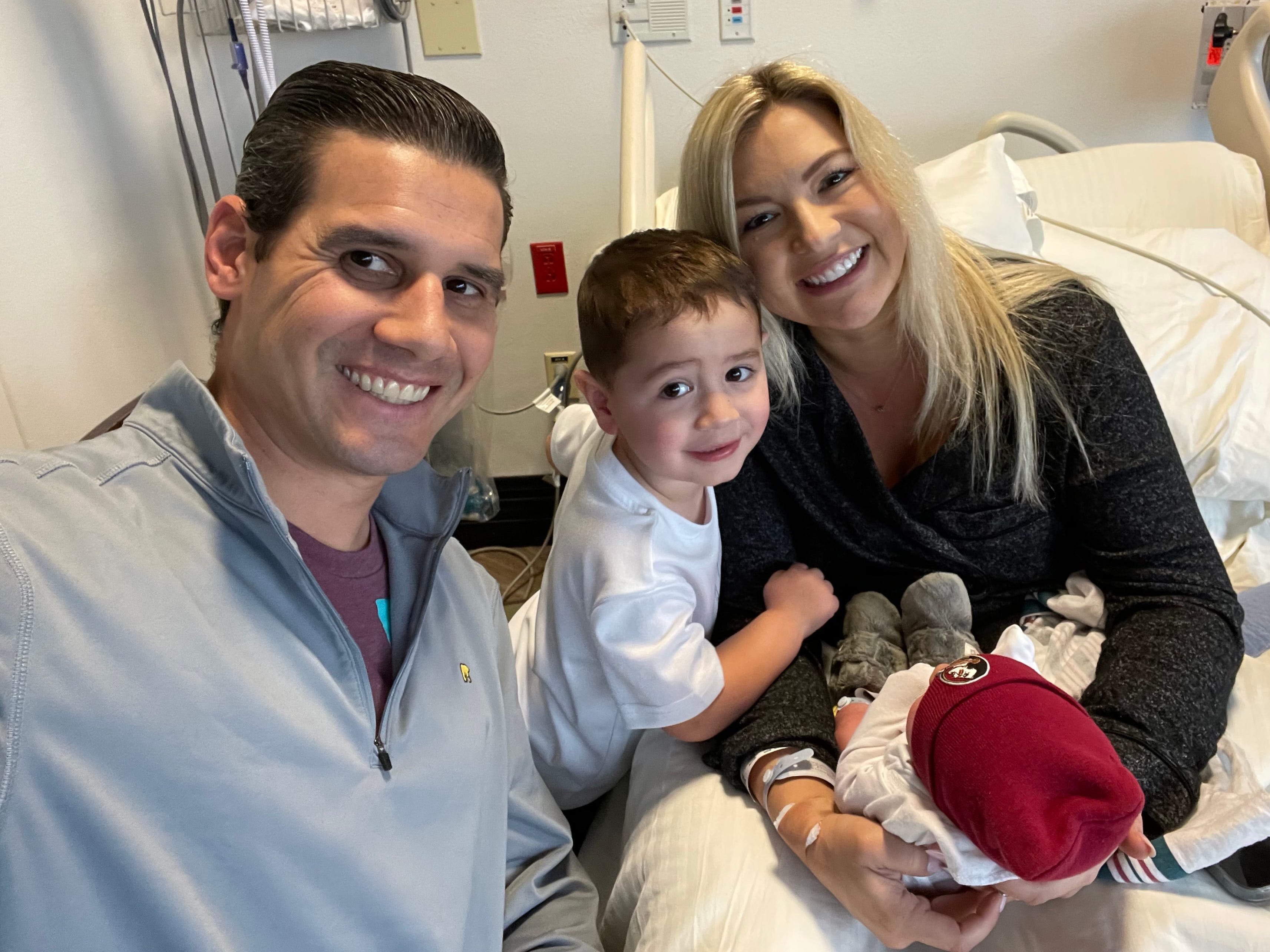 Ultima Espino with her husband and sons.