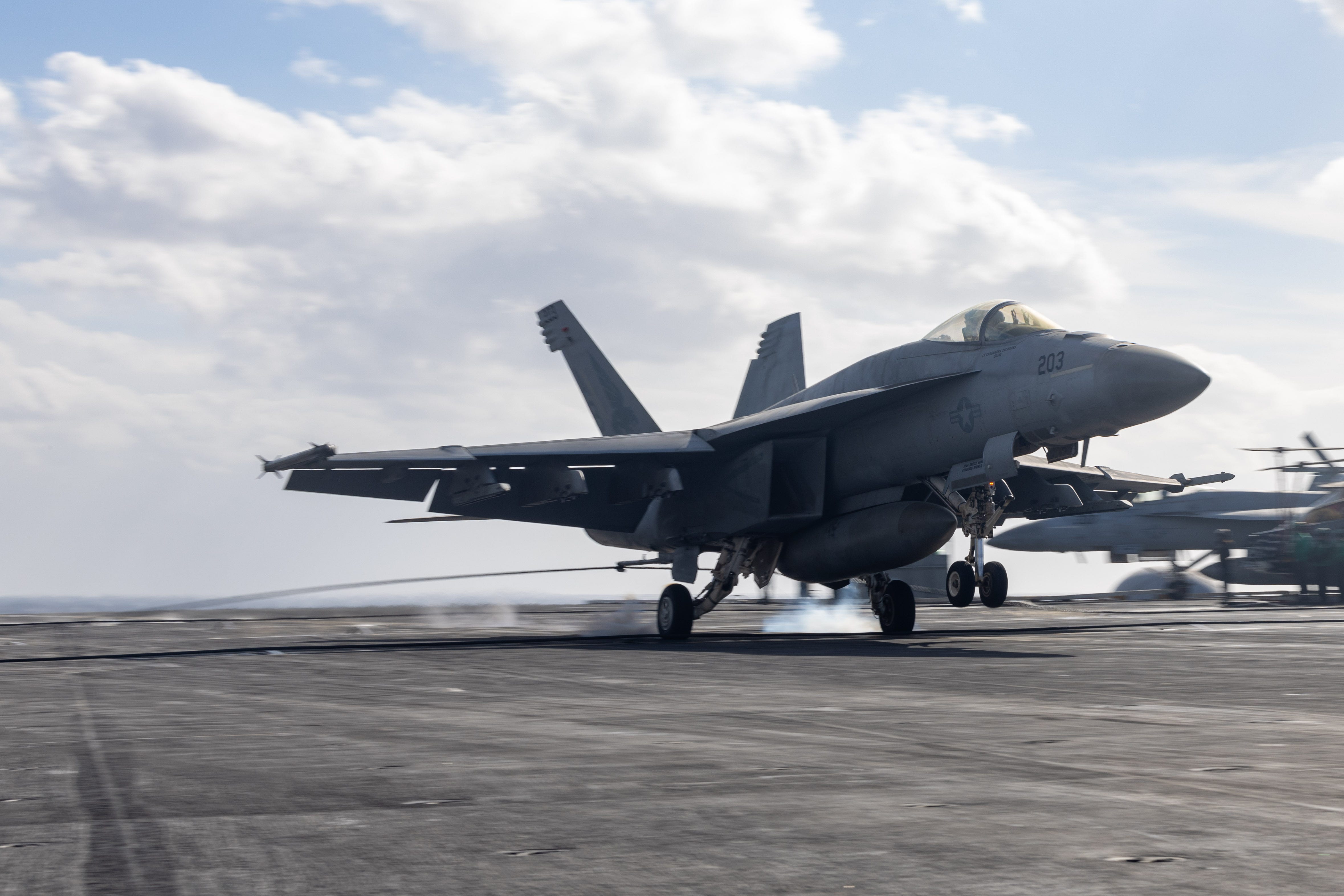 An F/A-18E Super Hornet, attached to the
