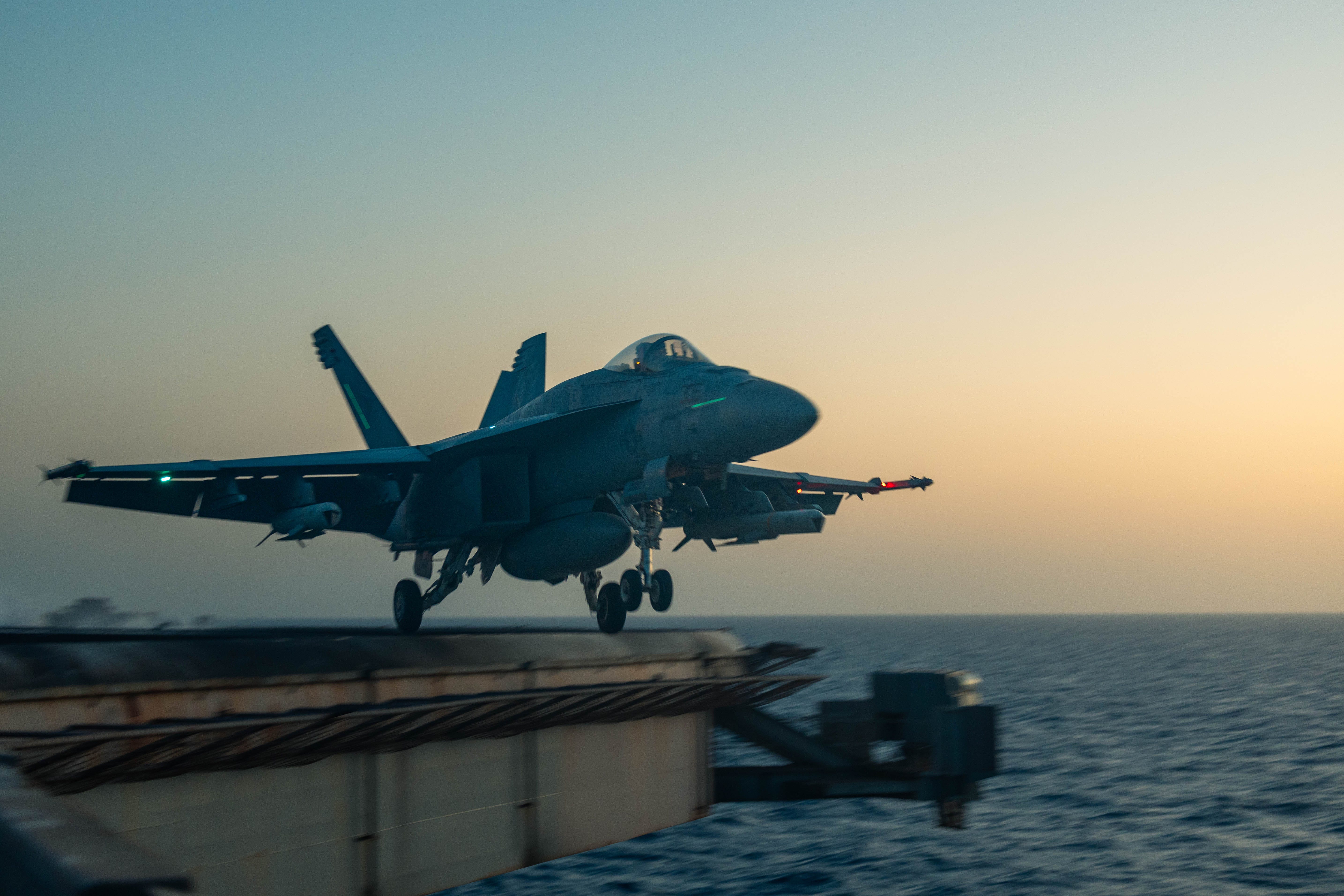 An E/A-18G Growler, attached to Electronic Attack Squadron (VAQ) 144, launches from the flight deck of the Nimitz-class aircraft carrier USS Harry S. Truman (CVN 75) during flight operations in the U.S. Central Command area of responsibility.