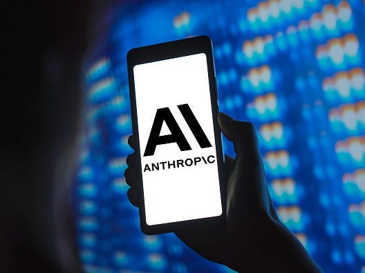 The Anthropic logo is displayed on a smartphone screen.