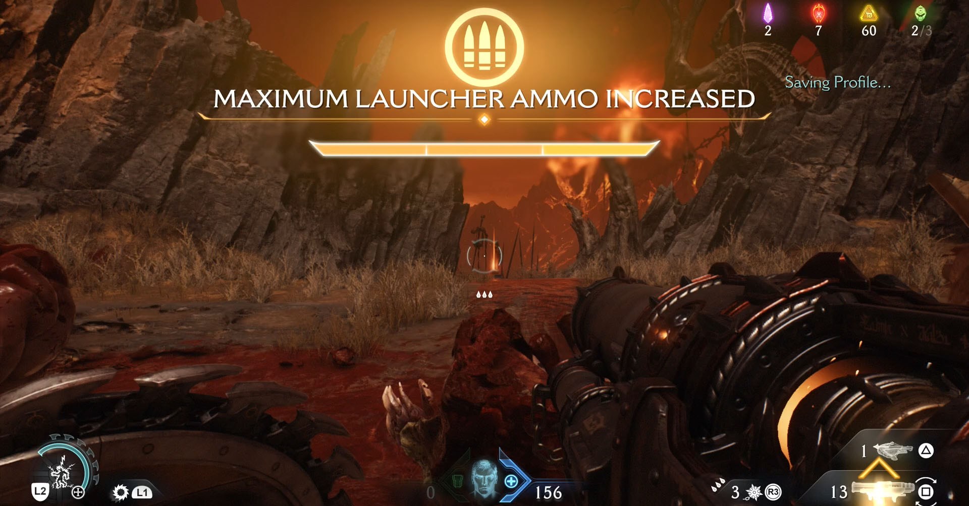 A Doom: The Dark Ages screenshot showing the HUD and a message saying “Maximum Launcher Ammo Increased”