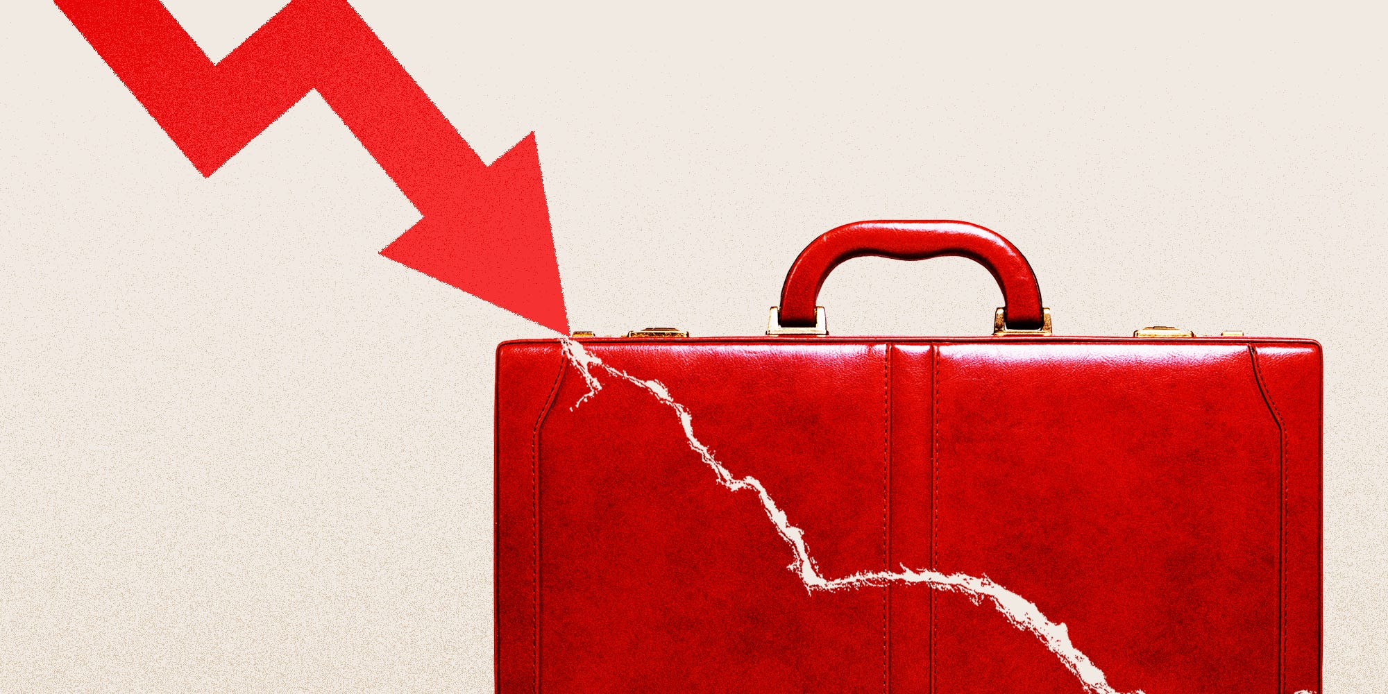 A downward stock arrow cracking a briefcase